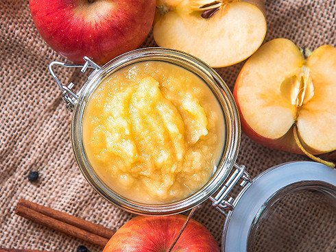 Fresh homemade apple sauce in a jar, top view